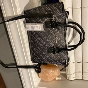 Kenneth Cole bag, I bought it brand new then could never find a cute way to wear